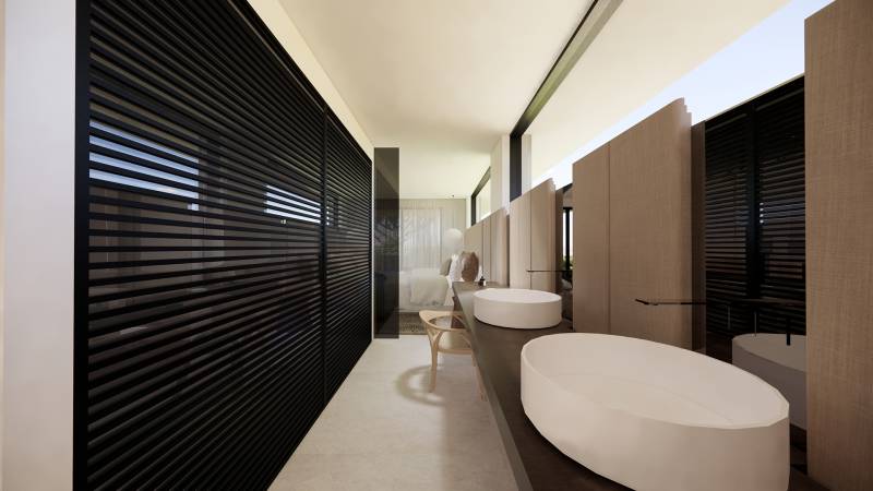 Salle de bain et dressing vitré donnant sur chambre